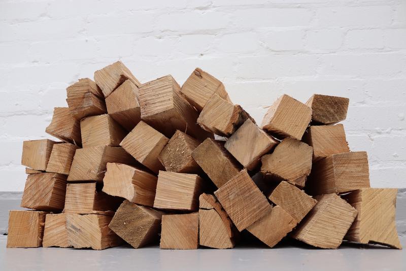 Kiln-dried logs in a pile