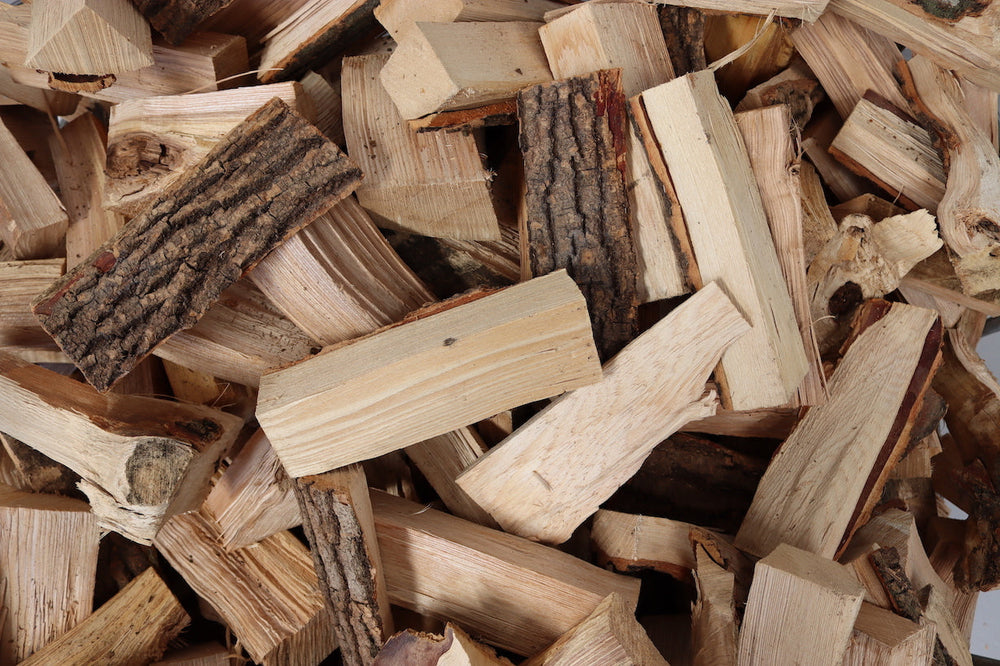 Pile of kiln-dried ash logs