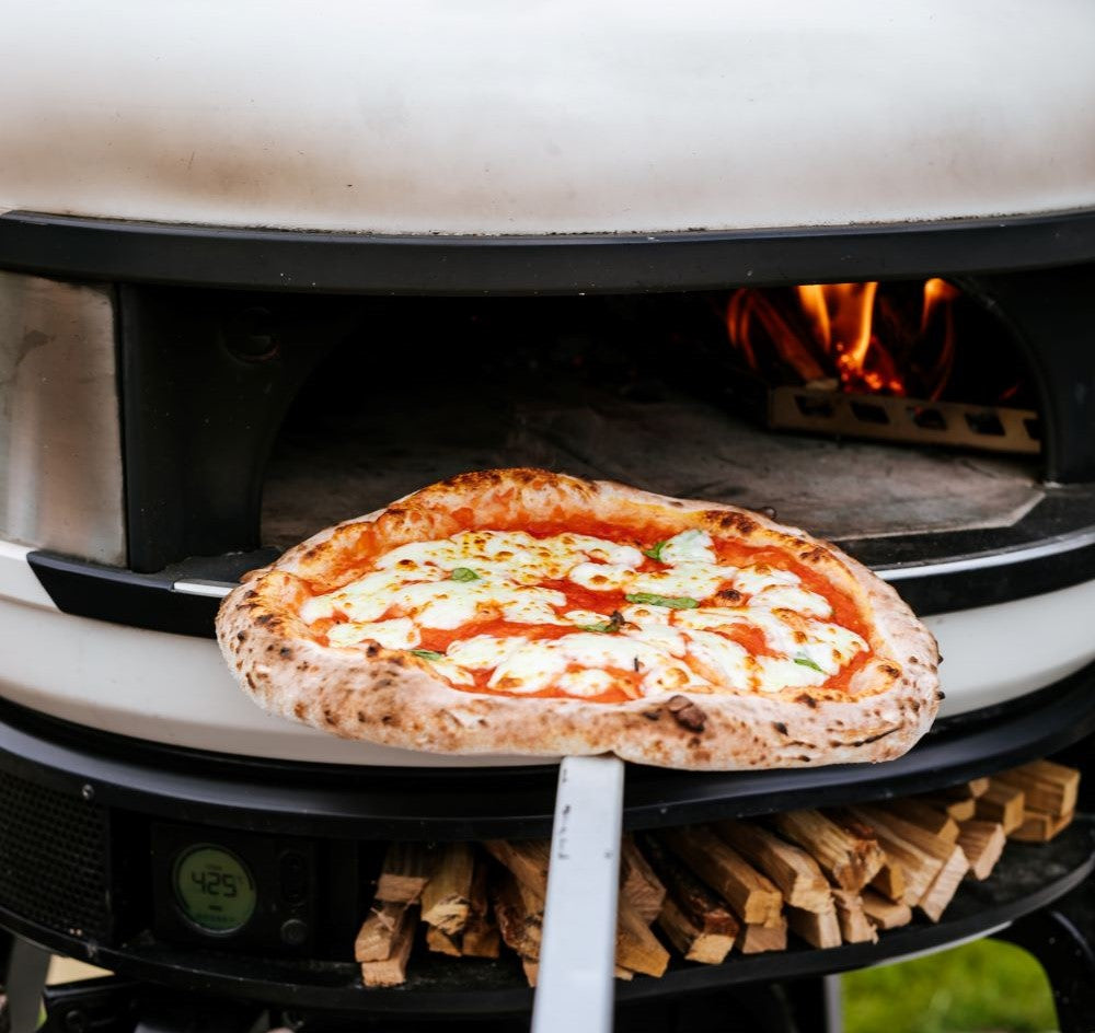 A Neapolitan Margarita pizza coming out of the Gozney Dome