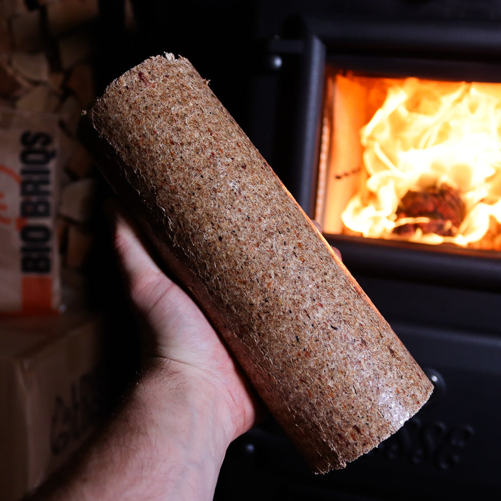 
                      
                        Bio Briqs firewood briquette in front of lit log burner
                      
                    