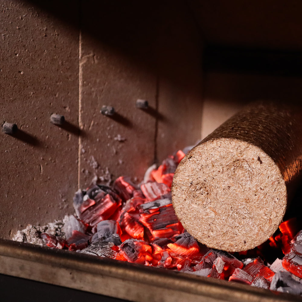 
                      
                        Bio Briqs firewood briquette in log burner
                      
                    