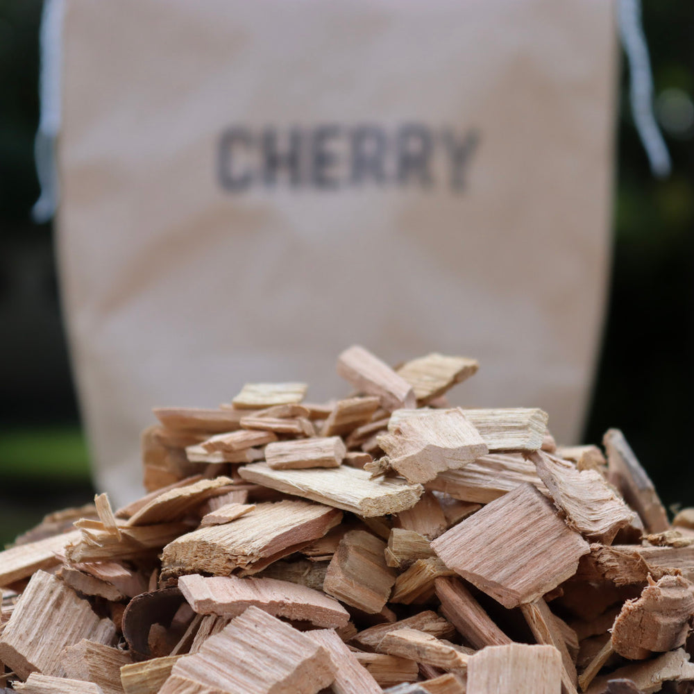 
                      
                        Love Logs British cherry smoking chips in pile on table
                      
                    