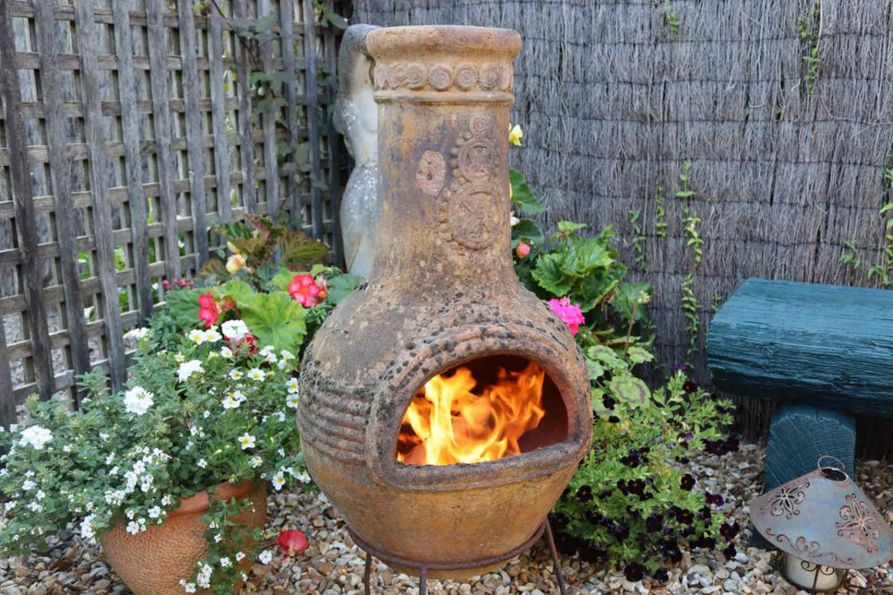 Chiminea Lit With Love Logs Wood