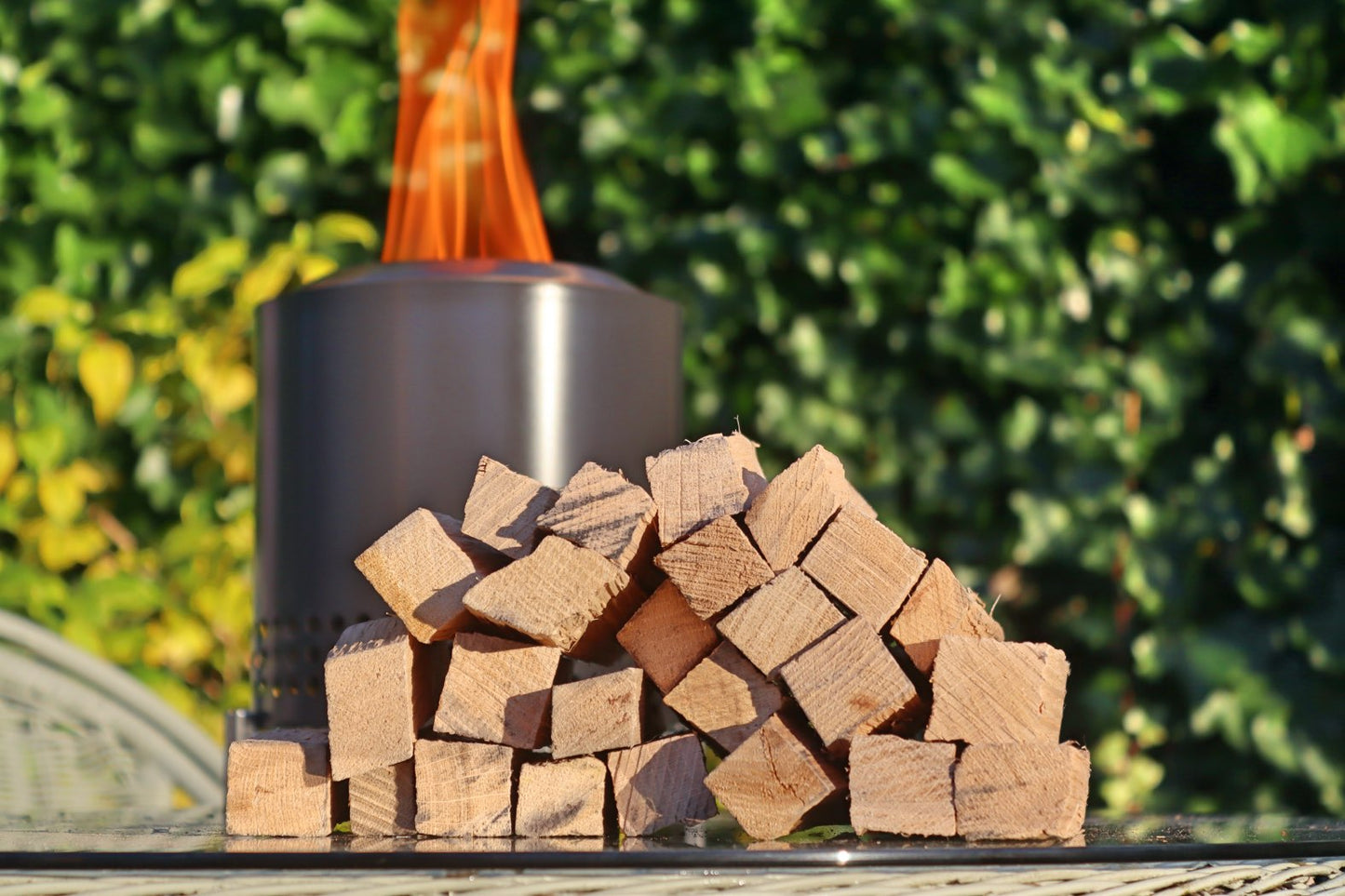 Love Logs Mini Fire Pit Wood stacked on table